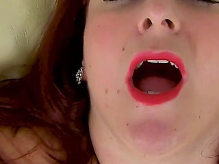 Redhead BBW Scorpio From the UK Puts Her Dildo to Work on the Sofa