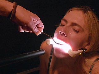 Filthy closeup of submissive whore playing with frozen cum