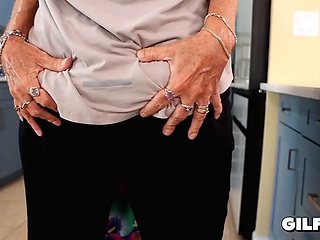Granny in Floral Dress Kneels to Suck Inked Bearded Studs Throbbing Cock Before Riding