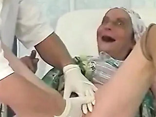 Hairy MILF gets fingered by her doctor