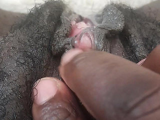 German black fat hairy wet  Pussy with big clit closeups