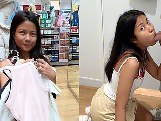 An 18-year-old Thai girl sucks me in a fitting room and I end up in her mouth