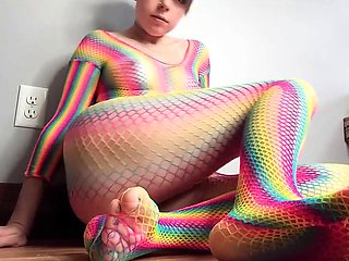 Teen in Rainbow Fishnets Fingers Herself