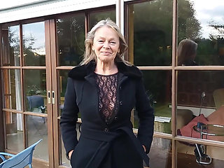 A Mature Woman Shows off Her Figure Outside in a Lace Bodysuit!