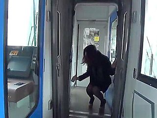 Asian pissing on train