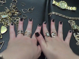 Golden jewelry and hand fetish