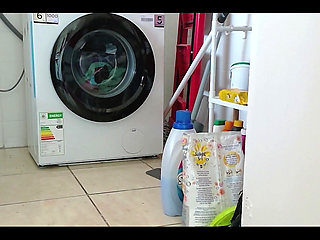 Laundry in Highheels Doing Laundry in Denim Shorts and Pointy Stilettos