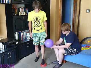 Thin, black socks blowing up balloons + footjob
